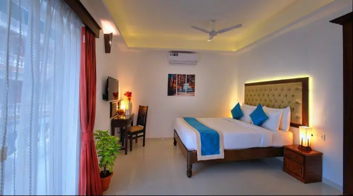 “AC double room at Nandakam Rest House with modern amenities including TV & Wi-Fi. Just ₹2299. Perfect for couples or 2 guests.”